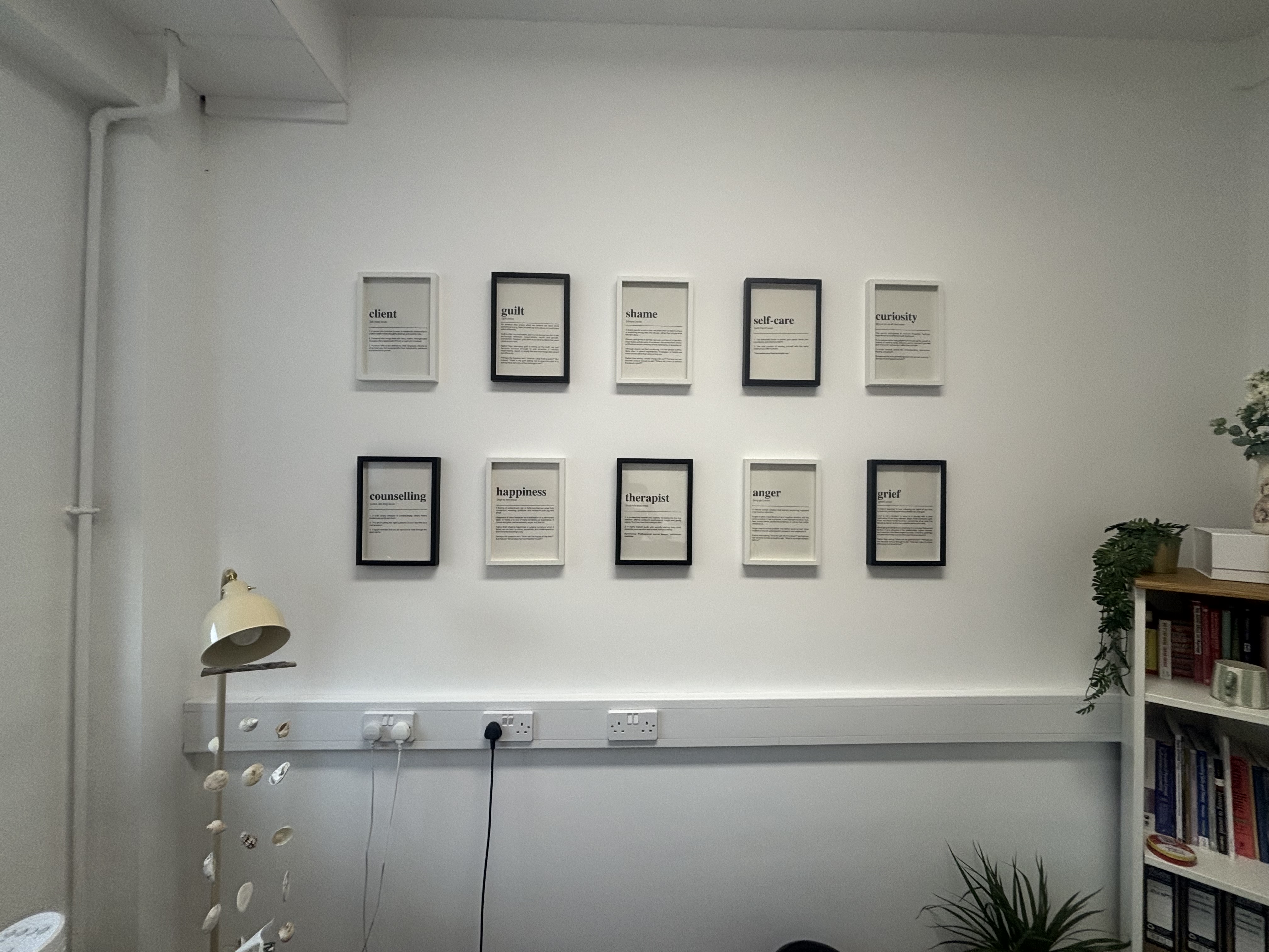 Photo wall showing a range of different feelings and emotions,.